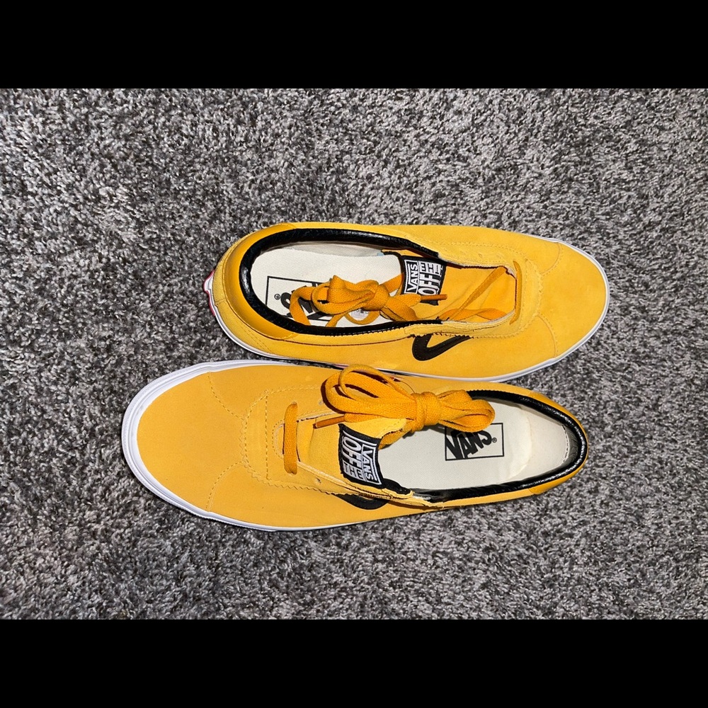 Black and gold VANS